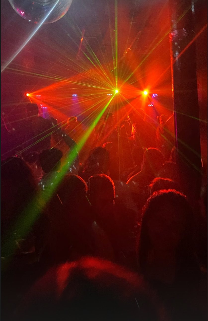 Crowd with red and green lasers