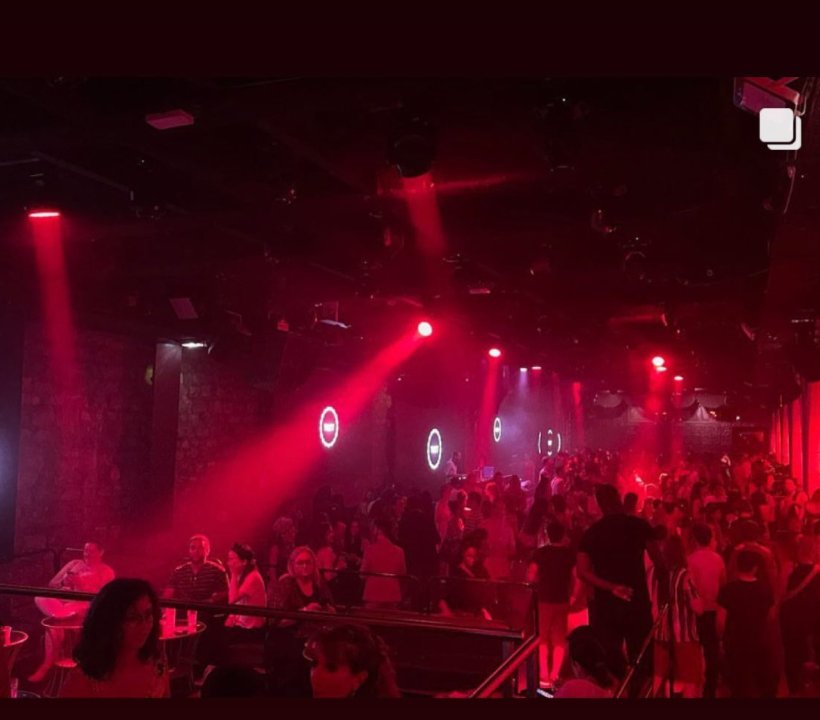 Crowd with red lights